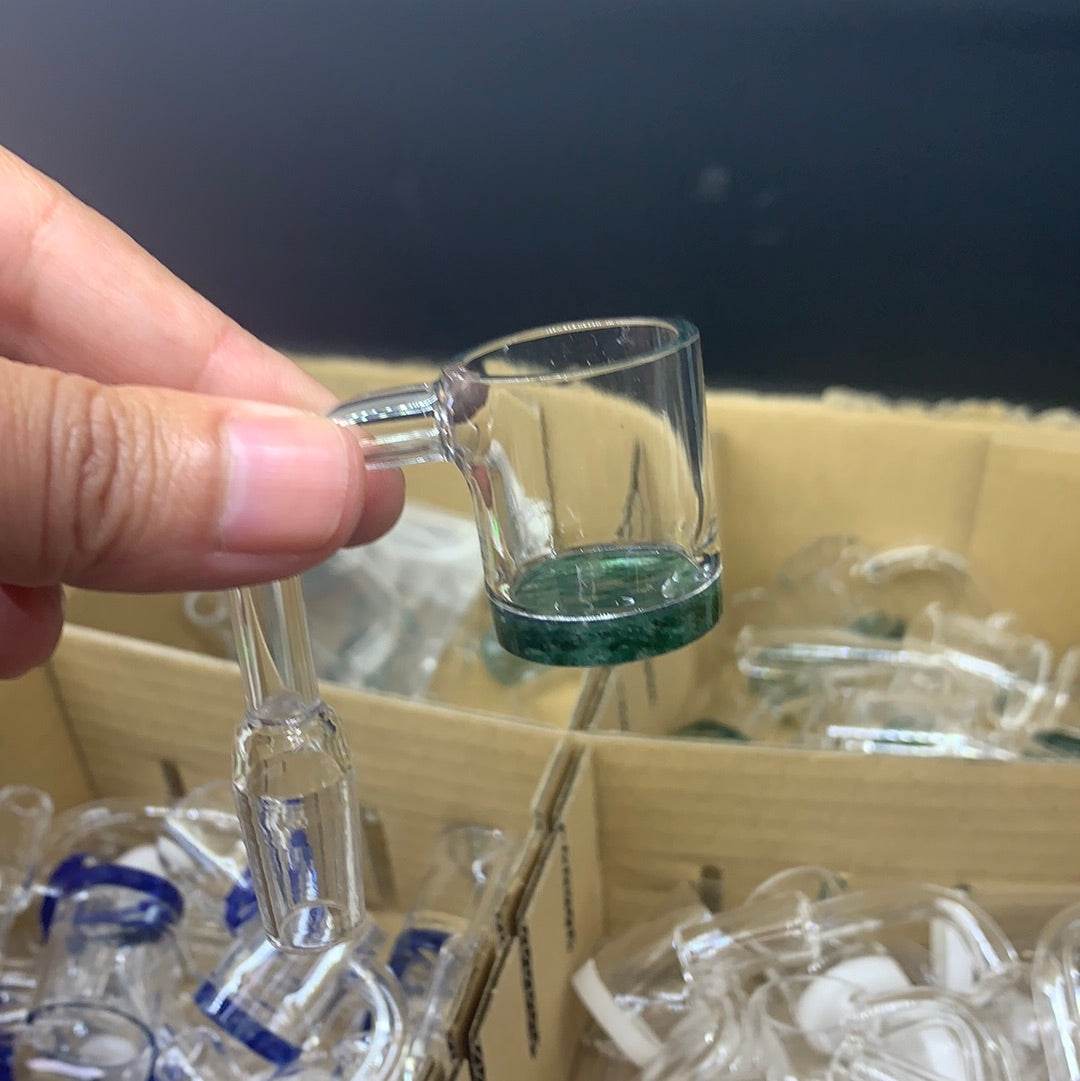 Hand holding a clear 14mm quartz banger for dab rigs showcasing its durable design