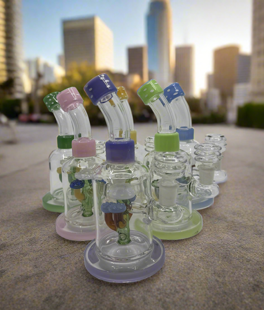Colorful glass bongs from RK Quality Glass displayed outdoors, perfect for wholsell smokeshop at rkqualityglass.com